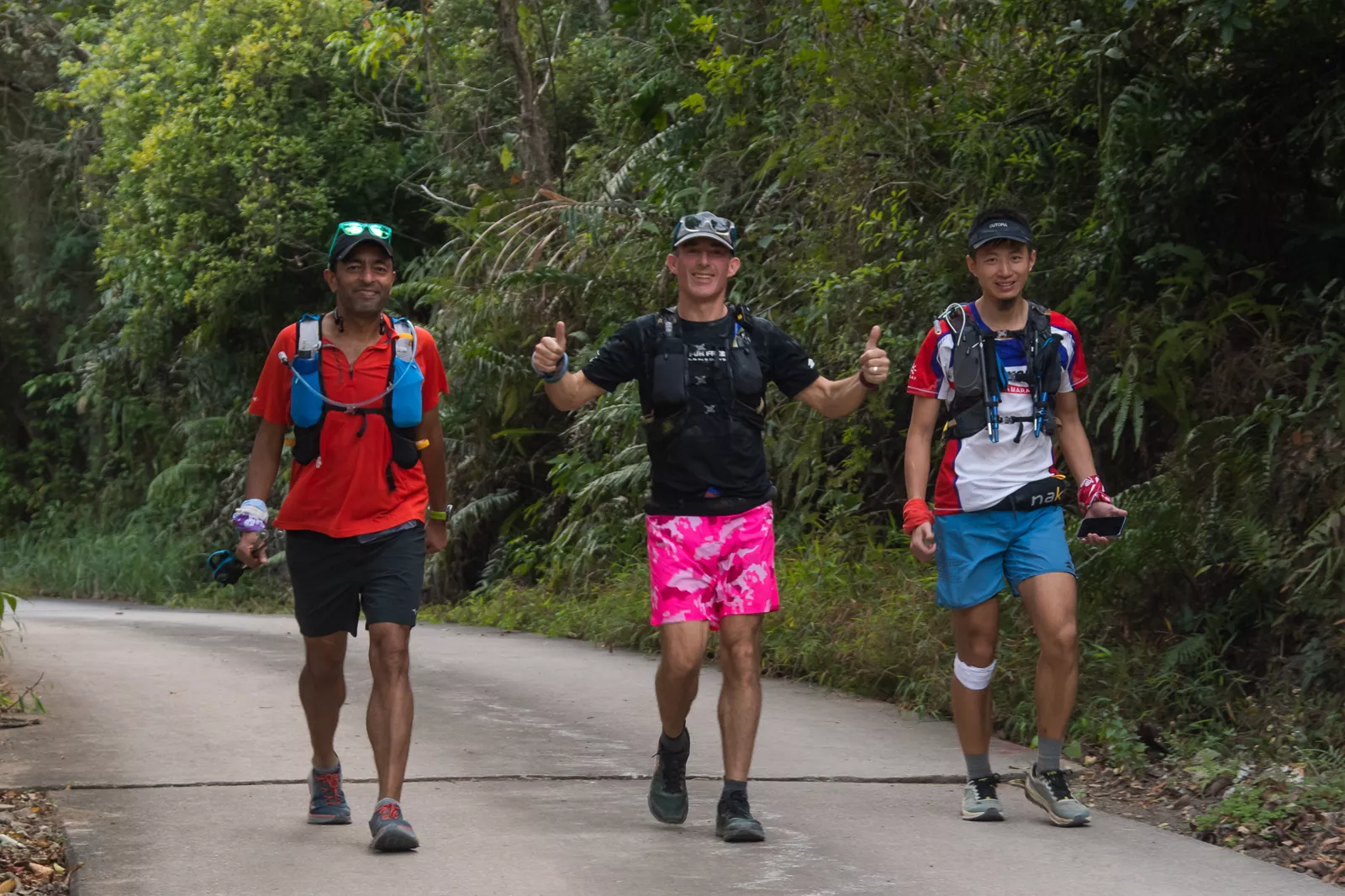 Jo Lodder (centre) pushing through the 5in5 ultra trail challenge with fellow runners